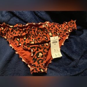 NWT Hollister swim bottoms. Size large